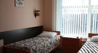 Гостиница Kaliber Мытищи Стандартный двухместный номер с 2 отдельными кроватями-1